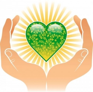 Hands holding earth heart