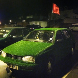 My mate astro-turfed his VW Golf and uses a golf flag as the antenna.
